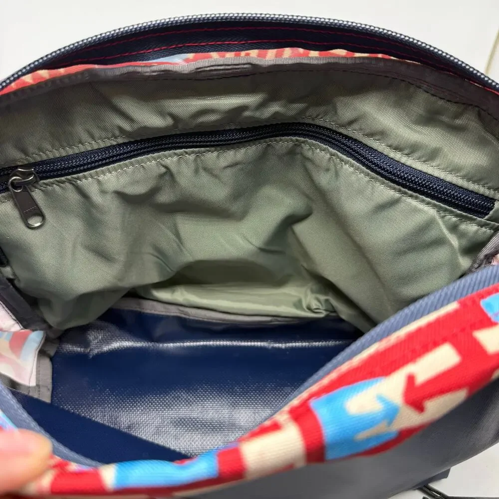 Gregory Water Resistant Flap Front Messenger Shoulder Bag Red Blue Cityscape